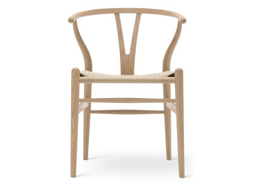 Chaise modèle Wishbone ou CH24 en chêne huilé blanchi. Edition neuve.
