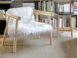 Altay Armchair. Natural upholstered in white Mongolian goatskin. 