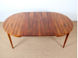 Extendable round dining table in rosewood 4 to 8 seats
