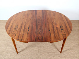 Extendable round dining table in rosewood 4 to 8 seats