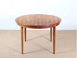 Extendable round dining table in rosewood 4 to 8 seats