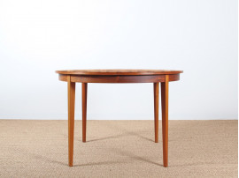 Extendable round dining table in rosewood 4 to 8 seats