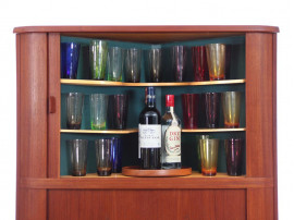 Angle bar cabinet with tambour doors