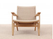 Mid-Century modern scandinavian arm chair in oak model CH 25 by Hans Wegner. New edition