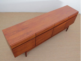 Mid-Century  modern scandinavian sideboard in teak by Ib Kofod Larsen for Faarup Mobelfabrik