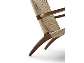 copy of Mid-Century modern scandinavian arm chair in smoked oak model CH25 by Hans Wegner. New edition