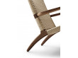 copy of Mid-Century modern scandinavian arm chair in smoked oak model CH25 by Hans Wegner. New edition