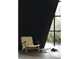copy of Mid-Century modern scandinavian arm chair in smoked oak model CH25 by Hans Wegner. New edition